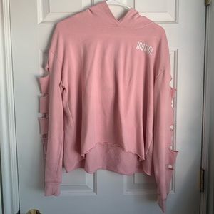 Pink justice shirt with good and rips in sleeves